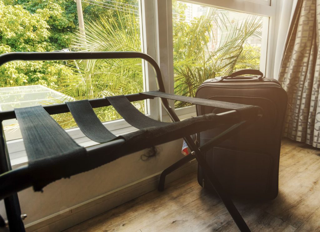 Hotel room luggage rack