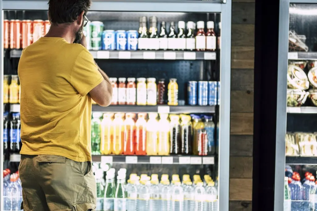 Nervous Man Picking Out Snack For Flight